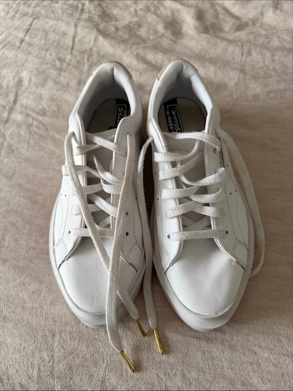 adidas Sleek White Platform Lace-Up Sneakers with Gold Accents